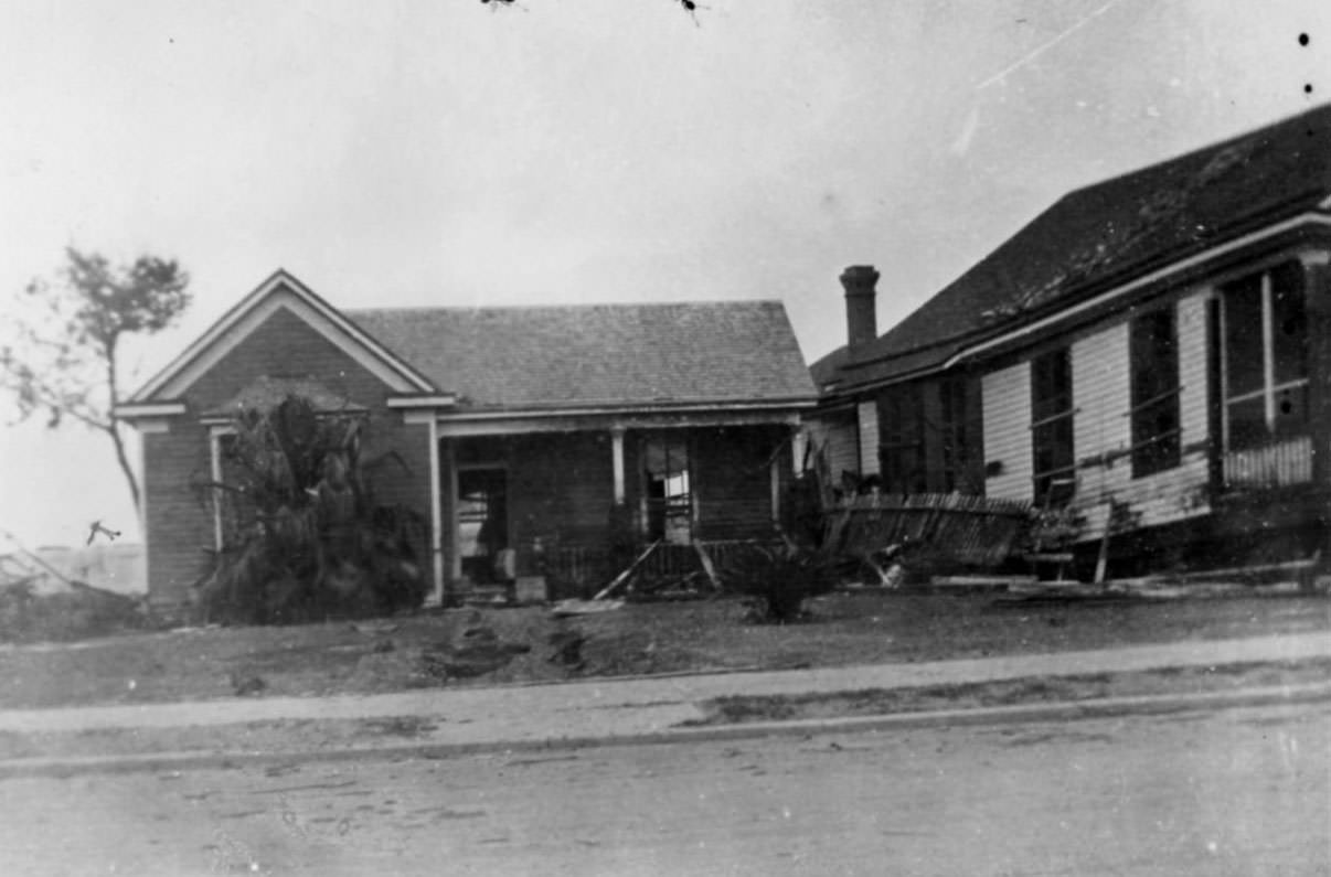 #27 A house that has been heavily damaged by a hurricane in Corpus Christi, Texas in 1919.
