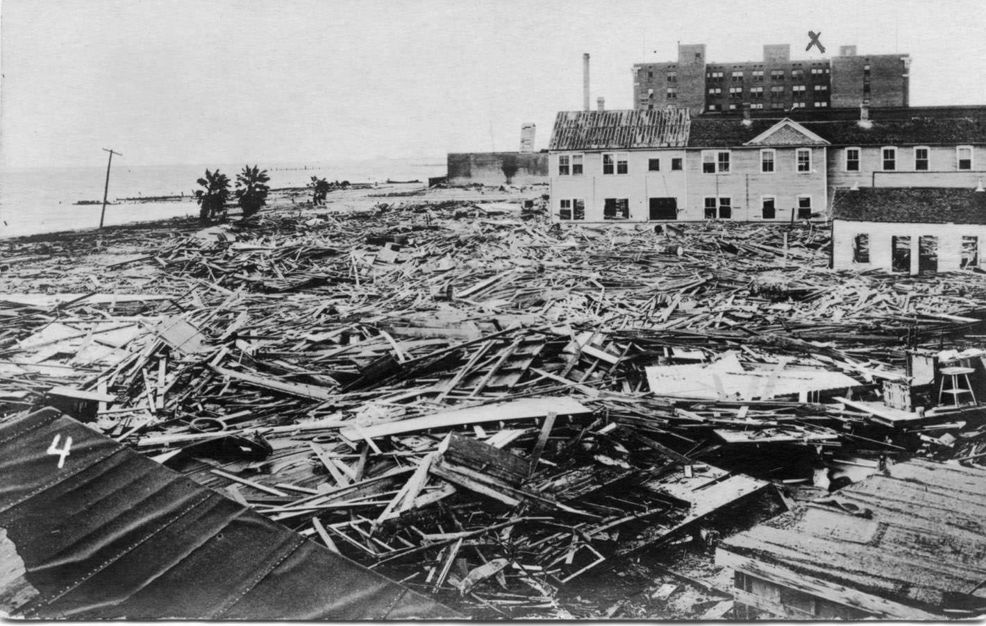 #26 Buildings along the shoreline surrounded by debris after the Corpus Christi hurricane of 1919.