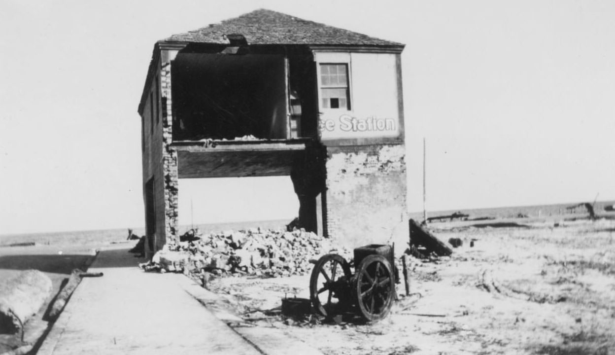 #9 A heavily-damaged two-story brick and concrete building, 1919
