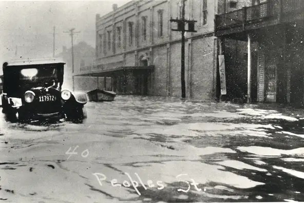 #86 This image was shot as the storm surge began to push into Peoples Street between Mesquite and Chaparral streets during the 1919 hurricane.