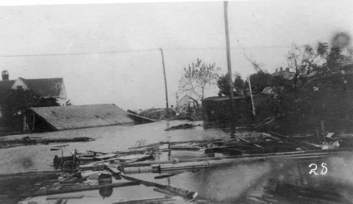 #6 Flooded intersection of Chaparral and Taylor Streets after the hurricane of 1919 in Corpus Christi.