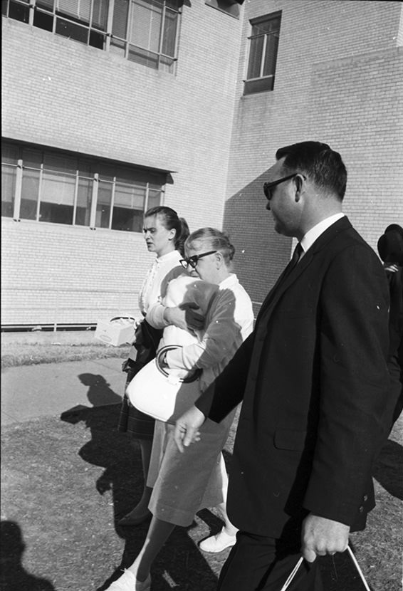 #119 Marina and Marguerite Oswald with Marina’s children walking into Parkland Hospital morgue following Lee Harvey Oswald’s death, 1963
