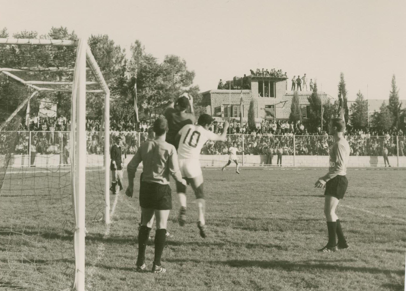 #61 A soccer game between the Dallas Tornado Soccer Club and an Iranian team during the club’s tour in Shiraz, 1967
