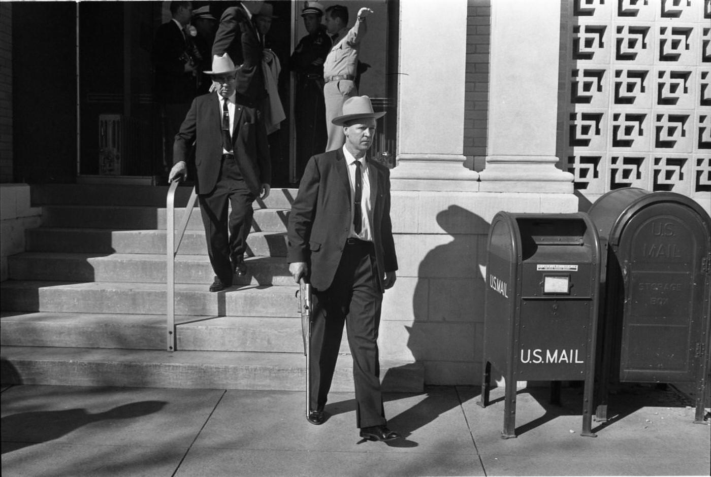 #26 Dallas Police officers exiting the Texas School Book Depository, 1963