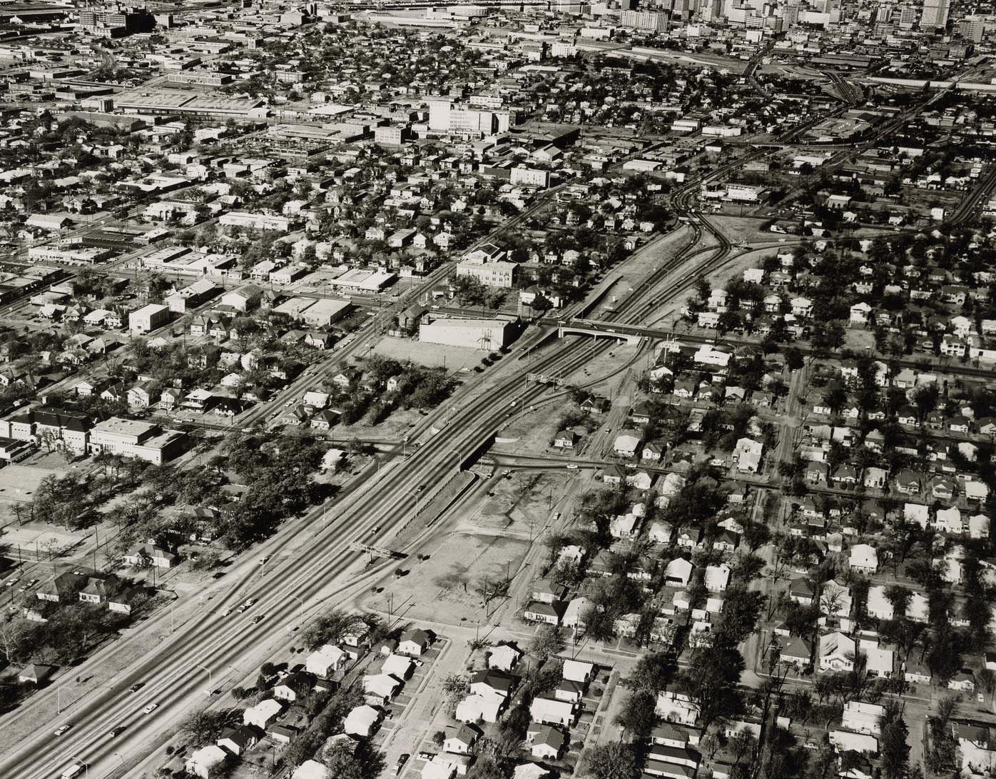 #32 Af an aerial overview of Kimble Park and the surrounding neighborhoods and downtown Dallas, 1966