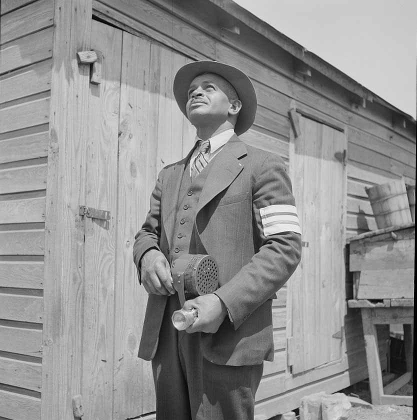 #5 Shipyard worker does volunteer duty as an air raid warden, Newport News, 1932