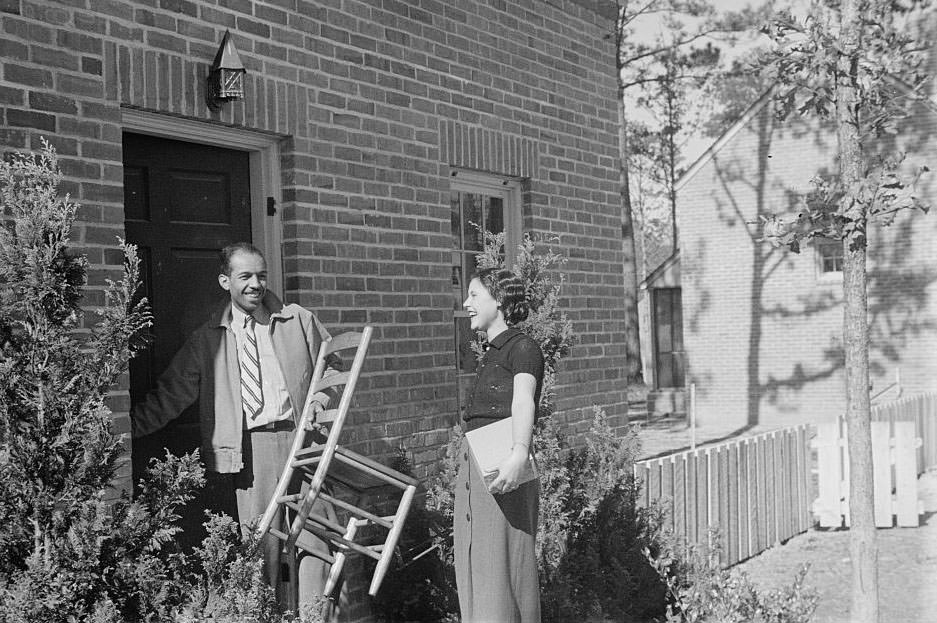 #47 Young couple moving in at Newport News Homesteads, Virginia, 1937