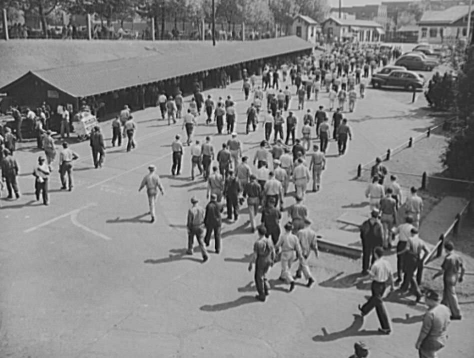 #9 Workers are leaving the gates of the yard, after their regular shift, 1941