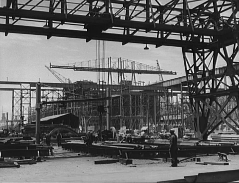 #42 General shipyard scene, with ships under construction on ways in the background, 1941