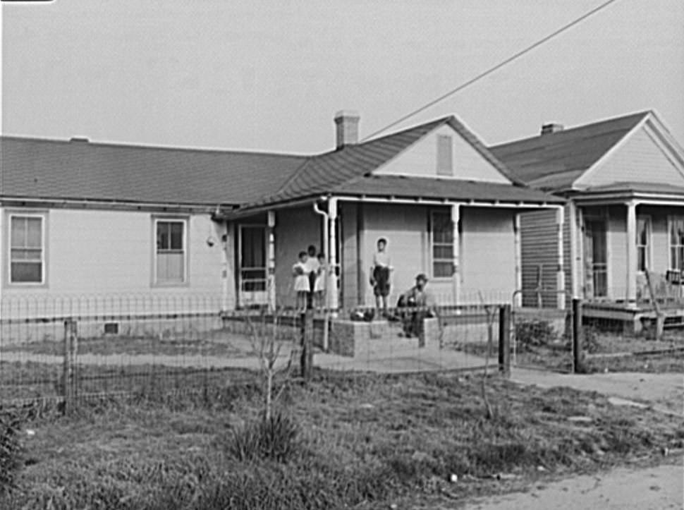 #51 Shipyard worker shown at his rural home with four of his children, 1942