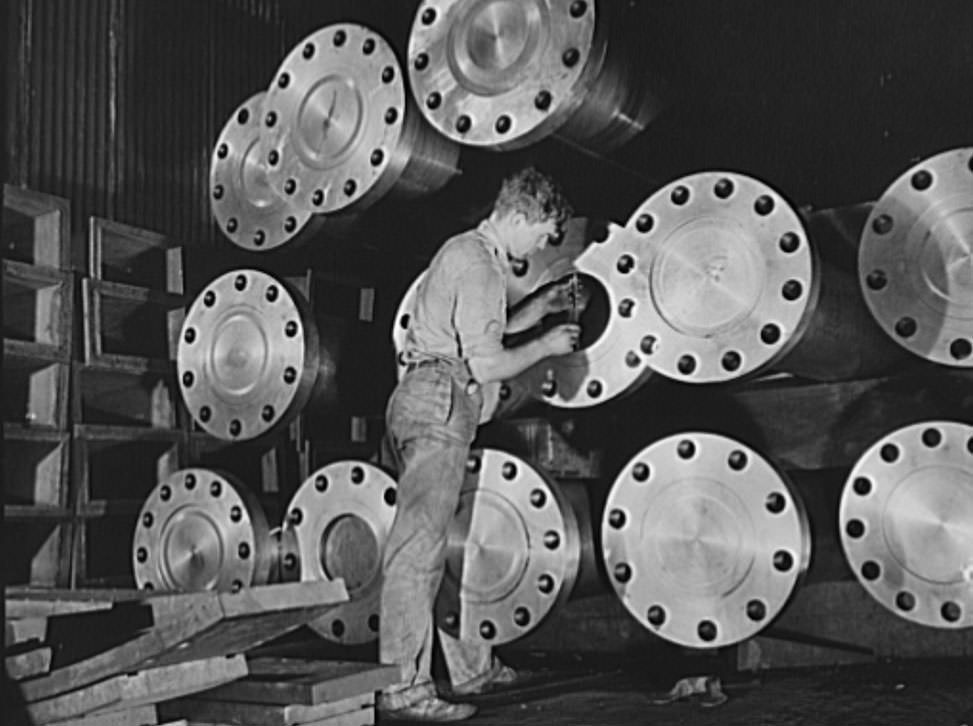 #23 Here is driving power for the Navy, a group propeller shafts waiting for installation in new destroyers for our two-ocean Navy, 1941