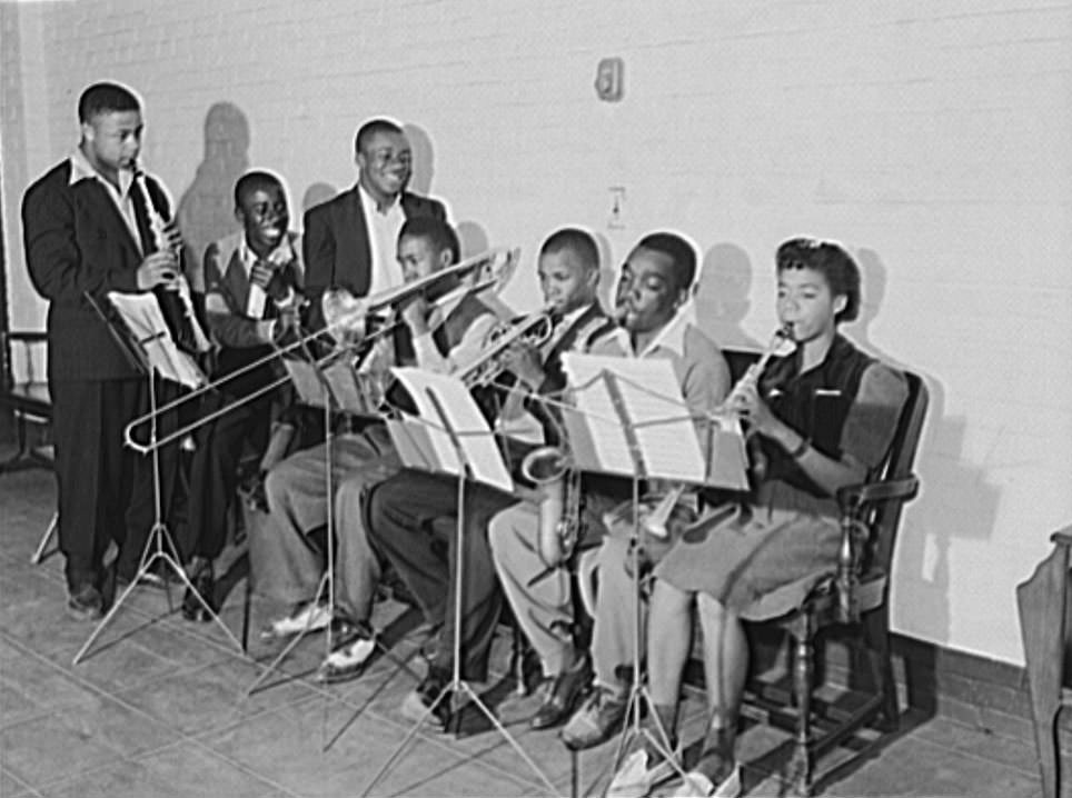 #56 Shipyard worker (second from right) participates in a musical organization, 1940 May.