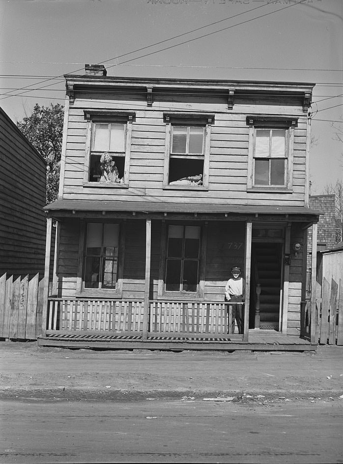 #4 House occupied by defense worker and family. They came from North Carolina farm. Rent ten dollars per month. Norfolk, Virginia, 1941