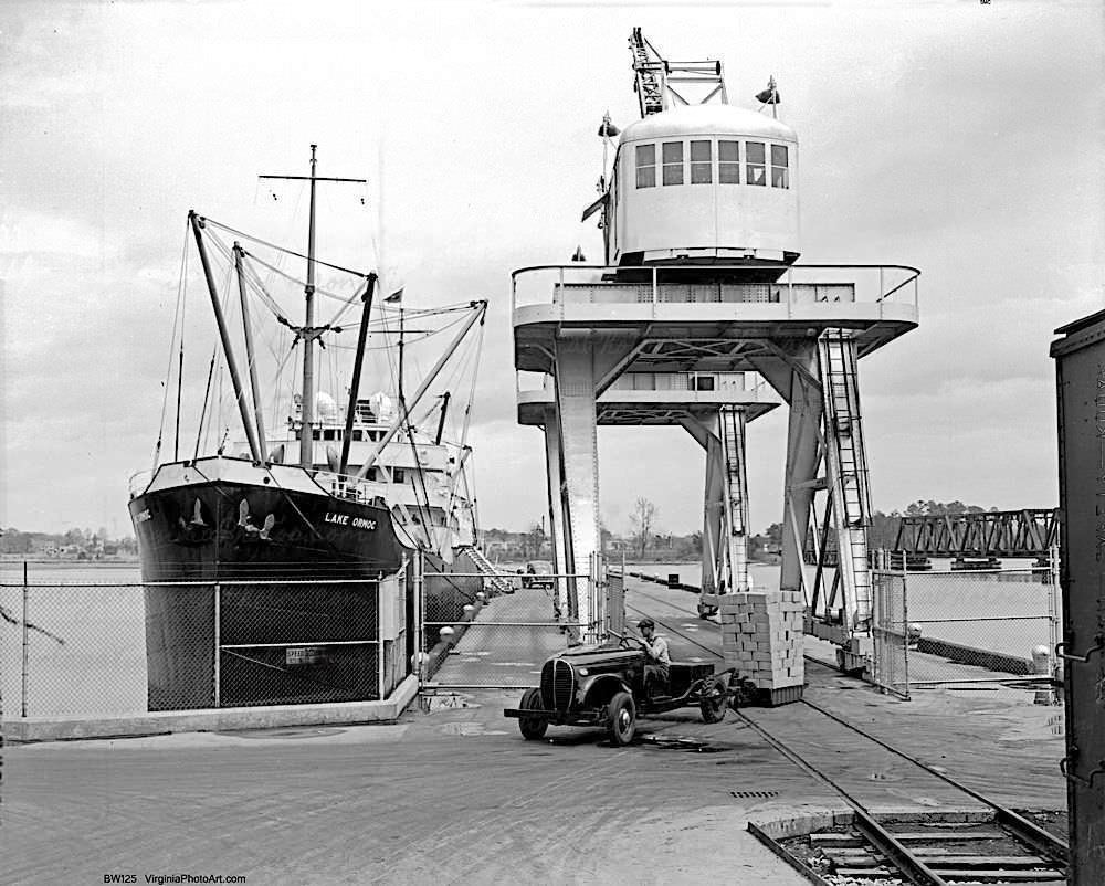 #85 Ford Truck Unloading Cargo at Docks Ship Lake Ormoc, 1944