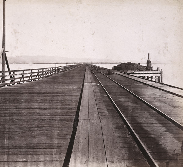 #103 Railroad Pier, San Francisco Bay — looking towards Oakland, 1863