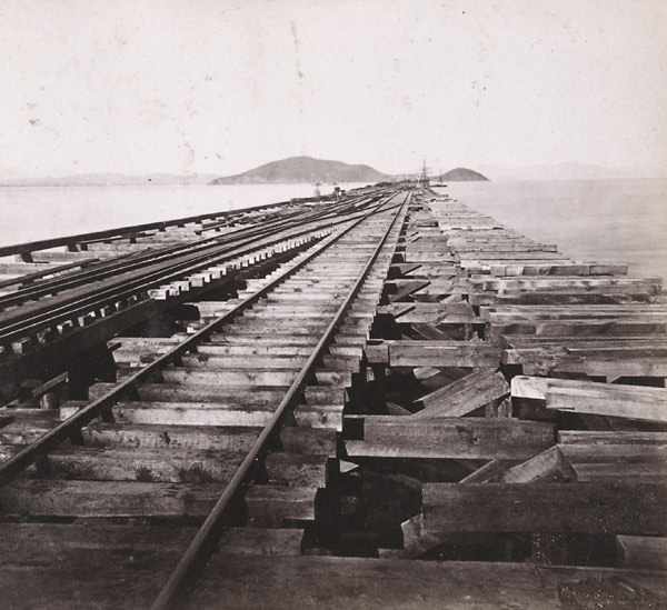 #77 Western Pacific Railroad Pier, Goat Island and San Francisco in the distance, 1868