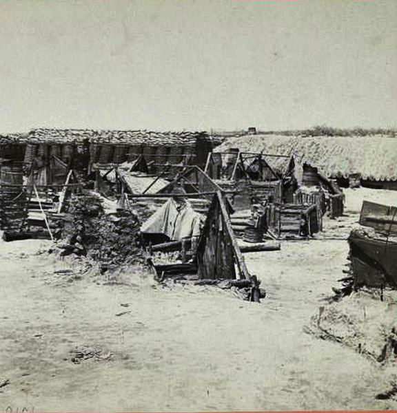 #130 Soldiers’ quarters in the Union Fort Rice adjoining Fort Sedgwick (fort Hell”.), 1865