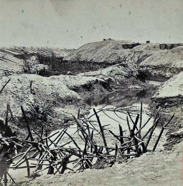 #131 Ditch and “Cheavaux de Frise” in front of the Union Fort Sedgwick, called by the rebel soldiers “Fort Hell”, 1865