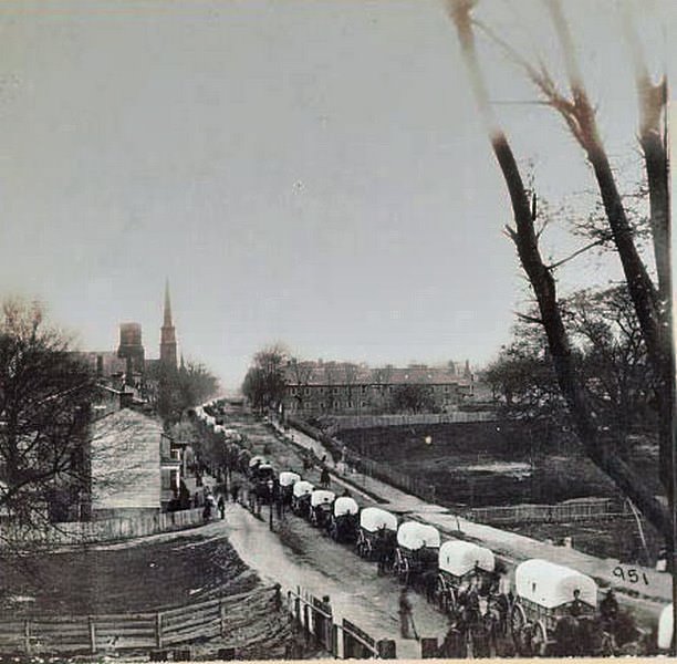 #133 First wagon train entering Petersburg, 1865