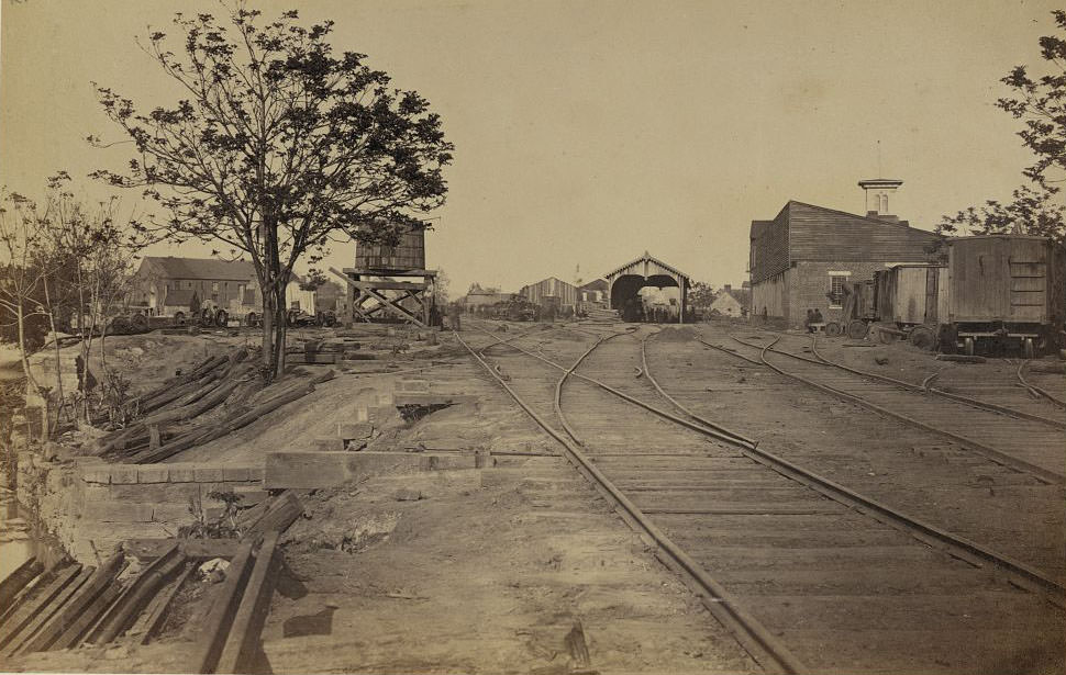 #136 Railroad tracks leading in to a United States Military Railroad station, 1865