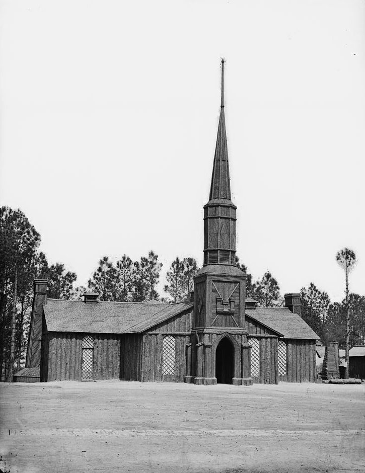 #151 Log church built by the 50th New York Engineers, with the engineer insignia above the door, 1865