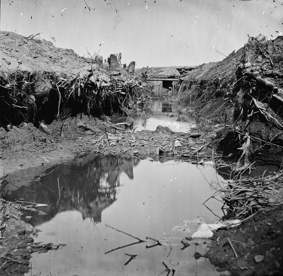 #154 Water-filled ditch on west side of Fort Sedgwick, Petersburg, 1865