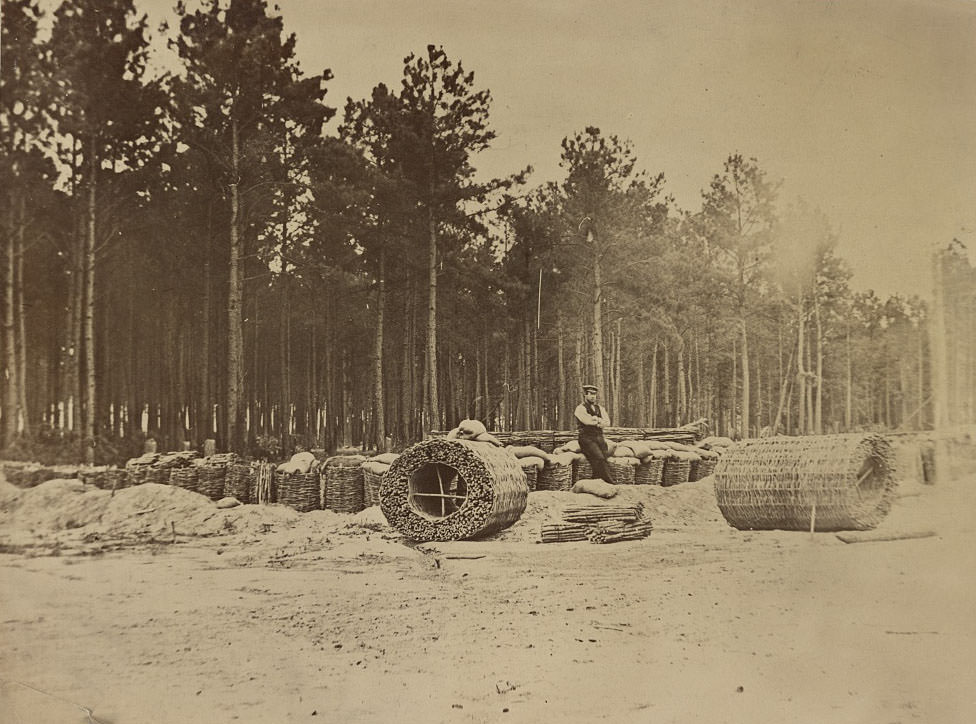 #29 Man seated on gabions in engineer camp in front of Petersburg, 1864