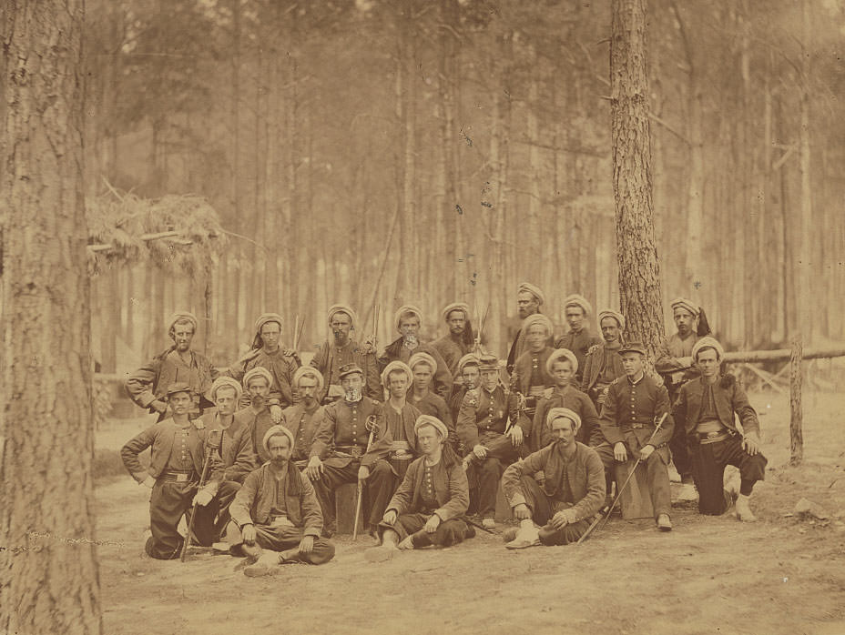 #52 Soldiers in Union uniforms with swords and others in zouave uniforms of 114th Pennsylvania Infantry Regiment, Co. G, Petersburg, 1864