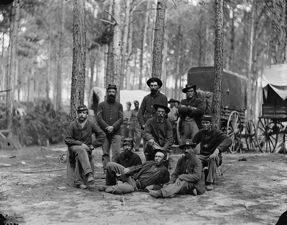 #83 Petersburg, Va. Group of Company B, U.S. Engineer Battalion; wagons in background,1864