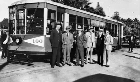#21 Mayor Louis P. Whitney (third from right ) and the City Commission pose with Phoenix streetcar No. 100 on its first run Christmas Day, 1928.