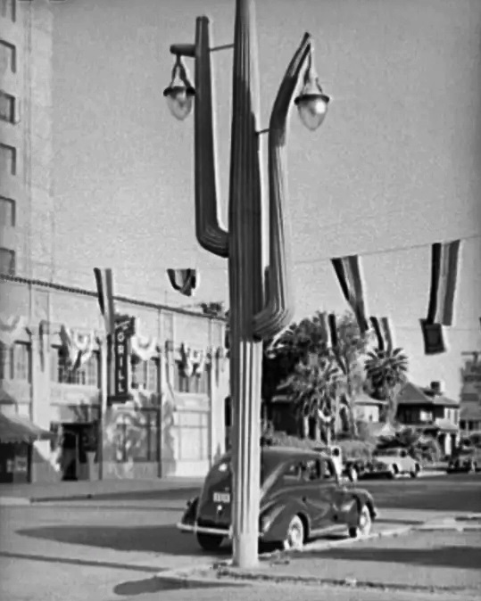 #79 A cactus streelight stands in Phoenix in May 1940.