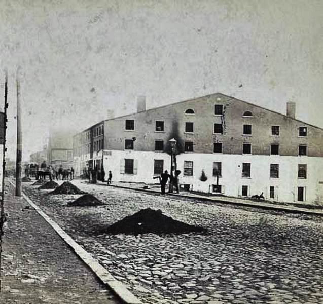 #134 A street view of the Confederate military prison in Richmond, Virginia, 1865