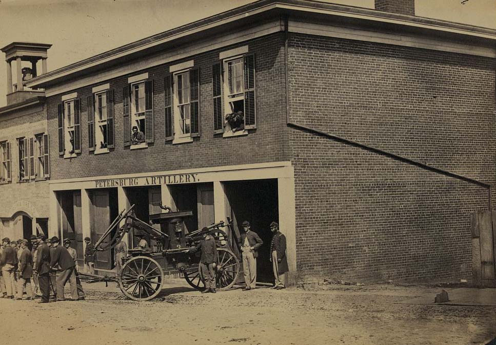 #141 Union soldiers pull a fire engine from a garage designated Petersburg artillery, 1865