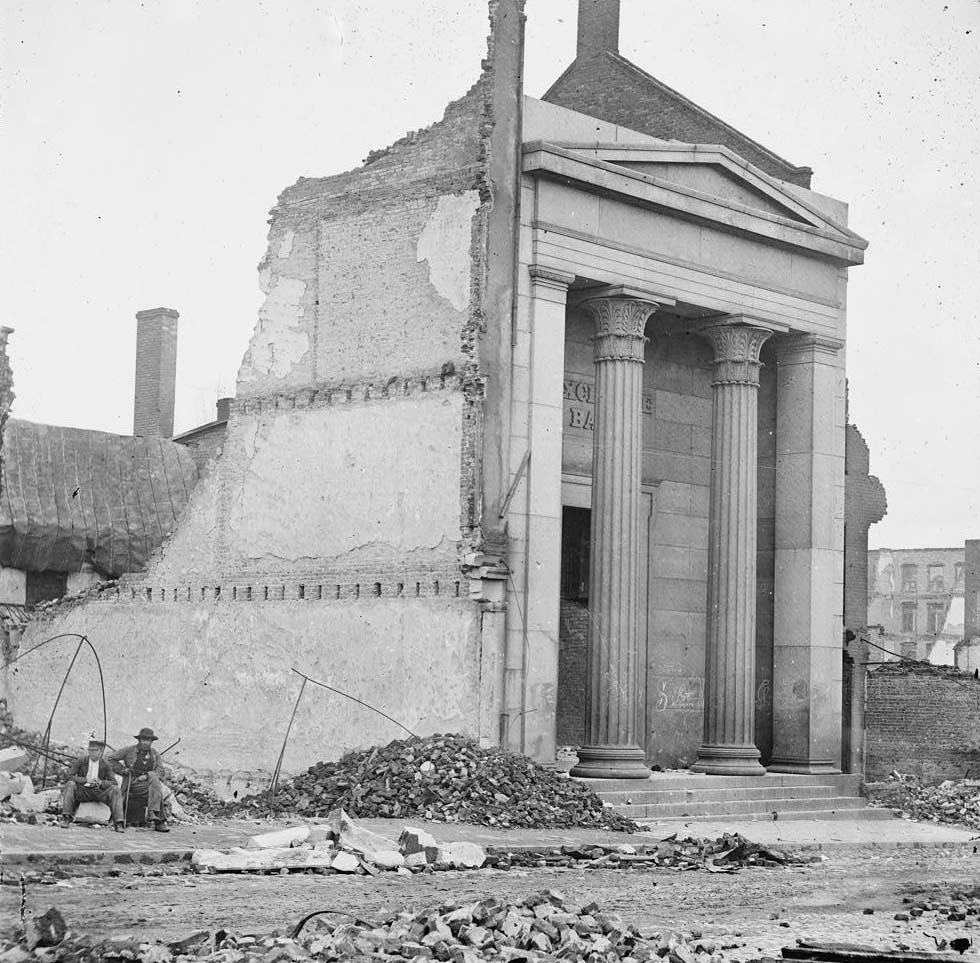 #66 Ruins of the Exchange Bank (Main Street) with the facade nearly intact, 1865