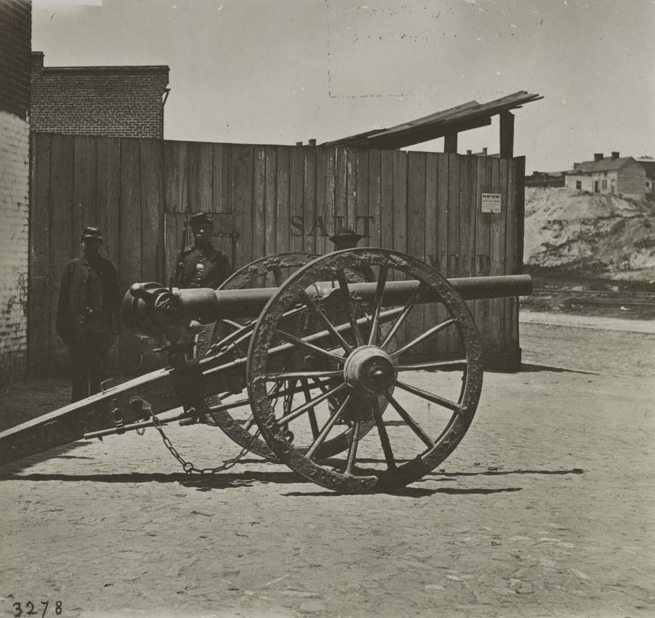 #74 Captured Whitworth gun on wharf awaiting shipment, 1864