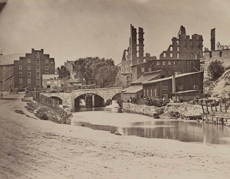 #21 James River and Kanawha Canal near the Haxall Flour Mills, and ruins of Gallego Mills in the distance, 1863