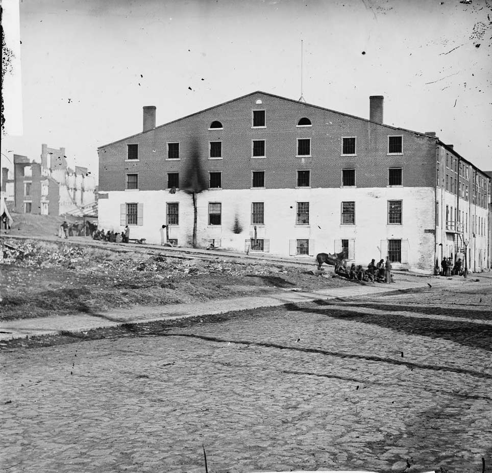 #207 Side and rear view of Libby Prison, 1865