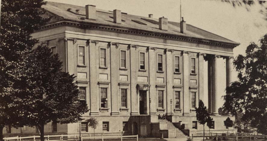 #95 West facade of the Virginia State Capitol building in Capitol Square Park in Richmond, Virginia, 1861