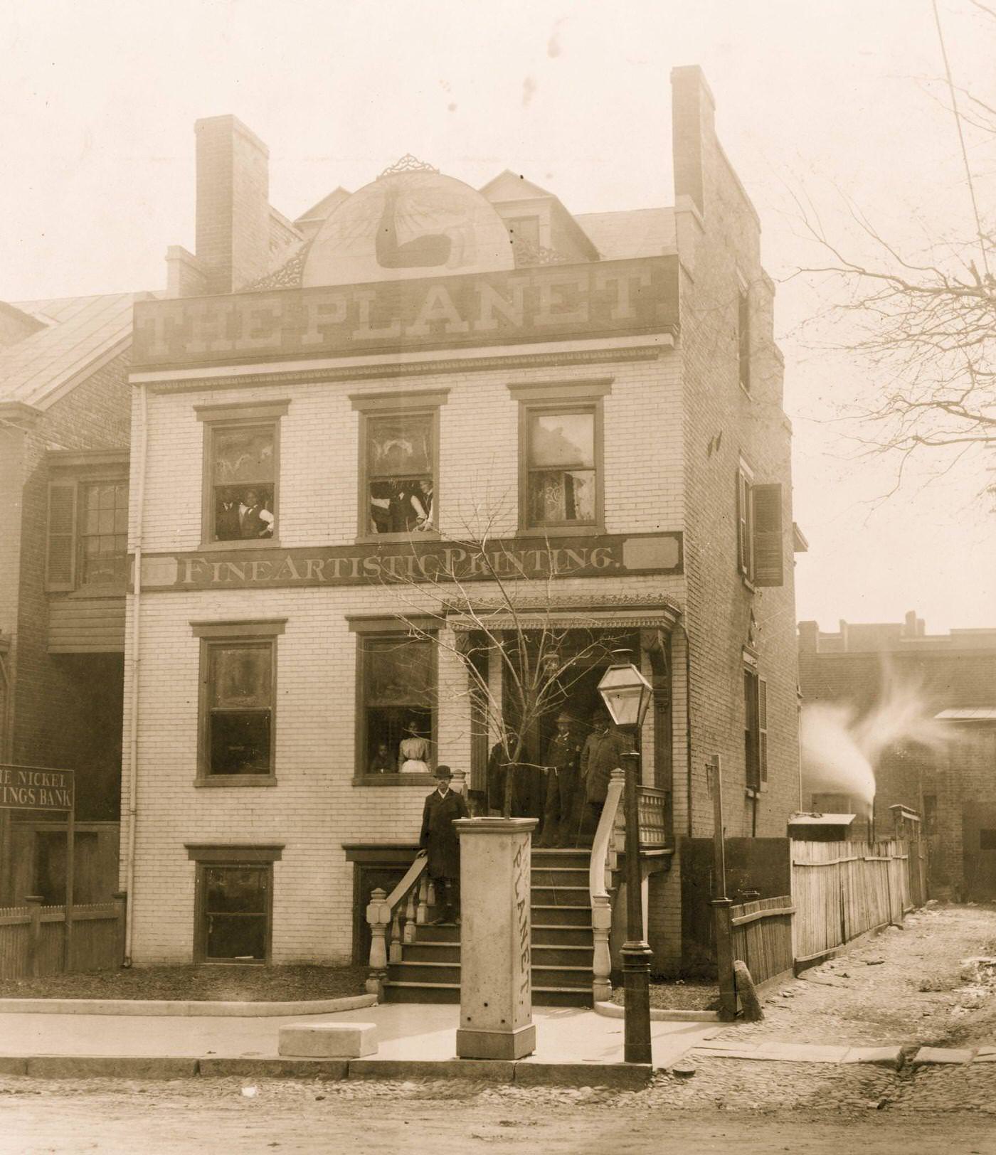 #123 People posed on porch of and in the Planet newspaper publishing house, Richmond, Virginia, 1900