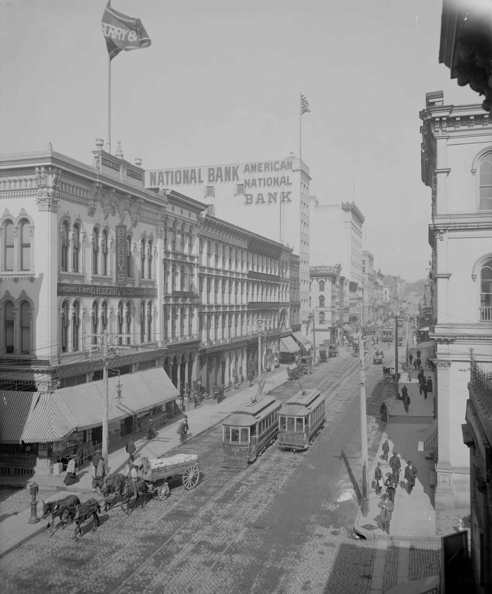 #125 Main Street in Richmond, Virginia before the age of Bank Bailouts. Public Transportation Dominates the street with very little vehicular traffic besides. Many of the Buildings are cast iron, 1900
