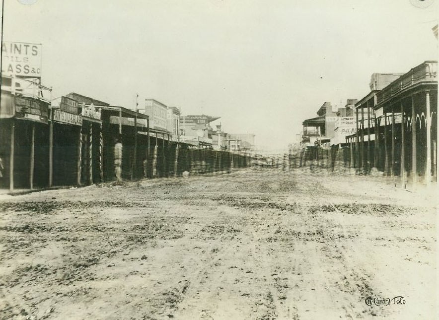 #63 Street scene with businesses, 1868