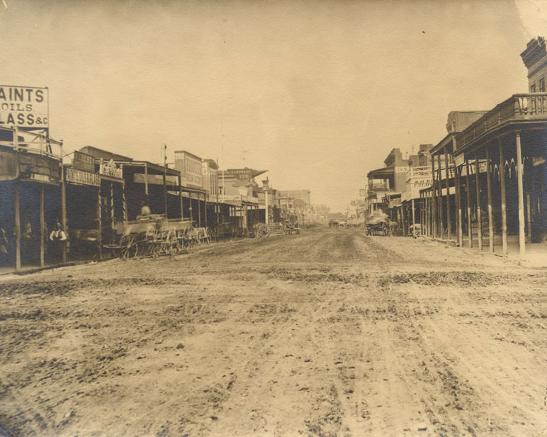 #72 J Street looking West, Sacramento City 1868,