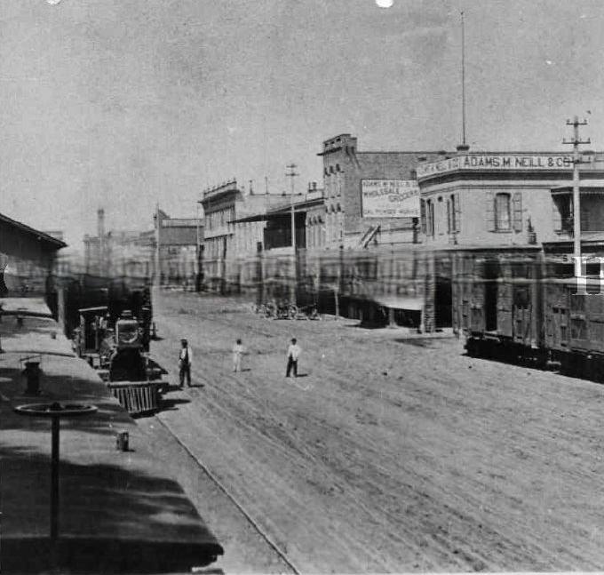#94 Front & L street looking North in 1865