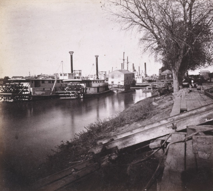 #120 1063. The Levee and Steamers at Sacramento City, 1860s