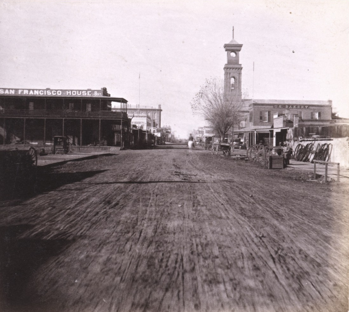 #121 1064. Sacramento City, K Street, Masonic Hall and Catholic Church, 1860s