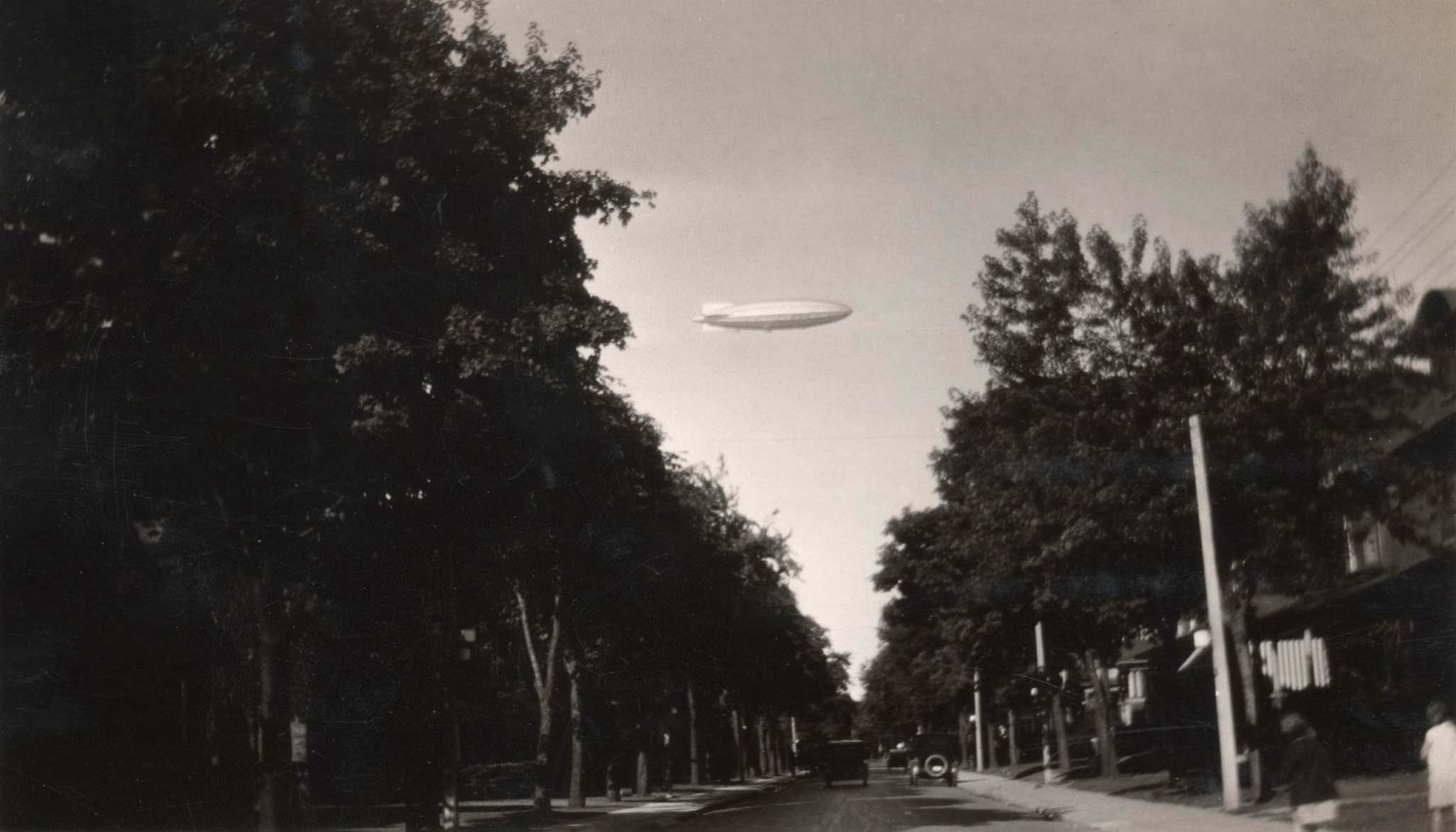 #168 60 Langley, looking west from Riverdale.” His Majesty’s Airship R-100 over Toronto on Aug 11, 1930.