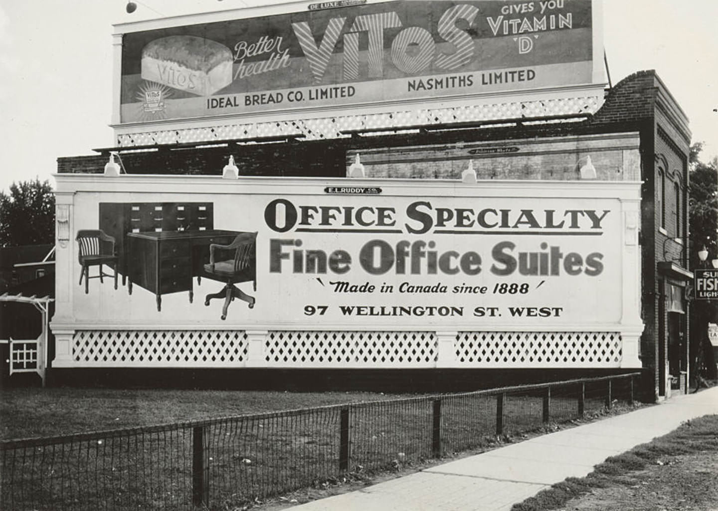 #152 A closeup view looking south of new billboards placed on top of and beside Superior Fish & Chips, 1887 Yonge Street, 1935
