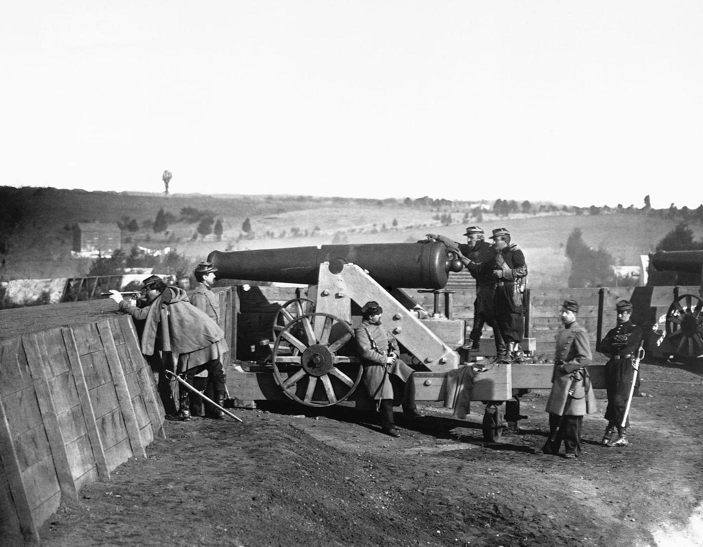 #77 Officers of the Fifty-fifth Infantry inspecting cannons at Fort Gaines, near Tenley, D.C., 1861
