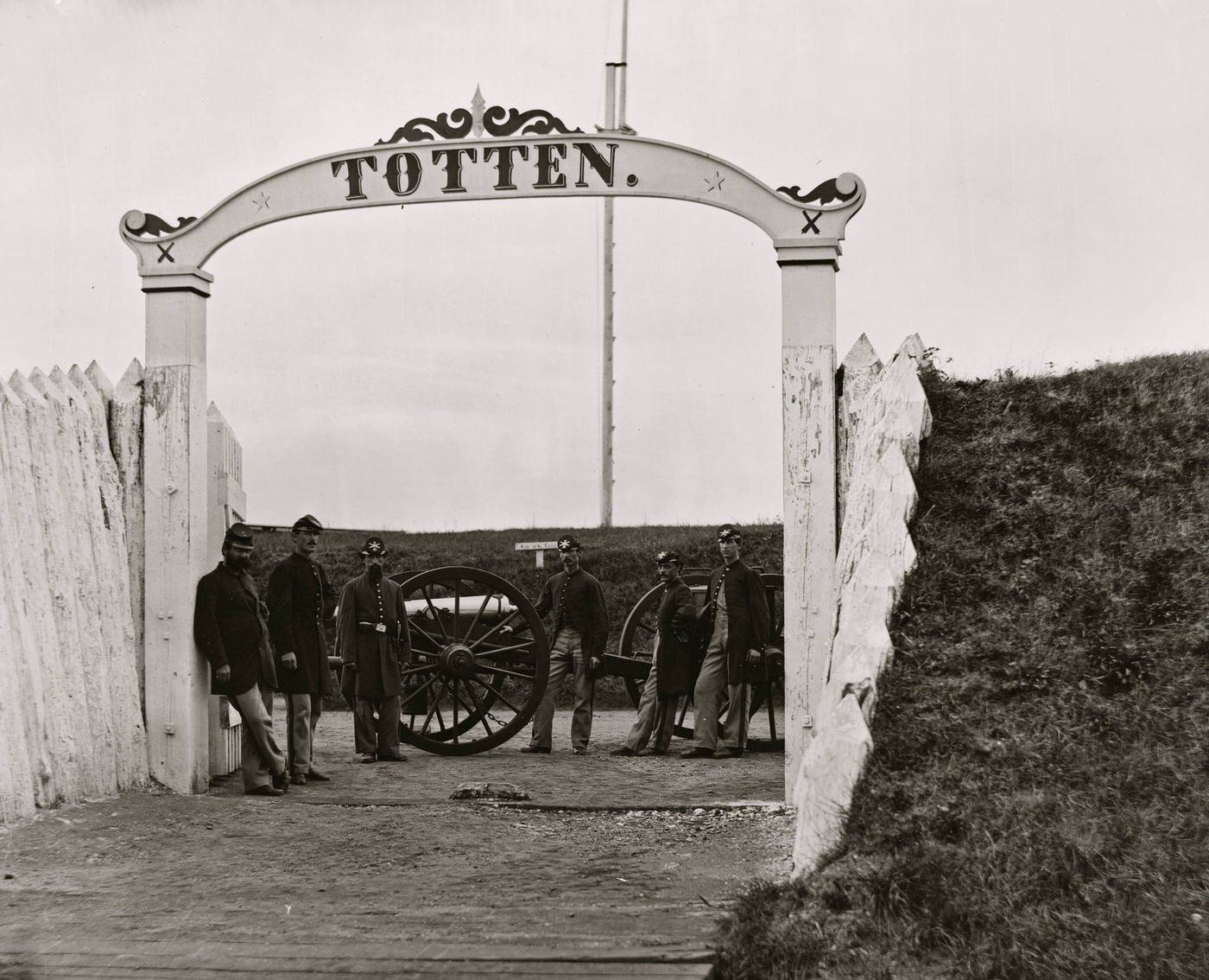 #171 Men and gun of the 3rd Massachusetts Heavy Artillery at ornamental gate of Fort Totten, Washington, D.C., 1865
