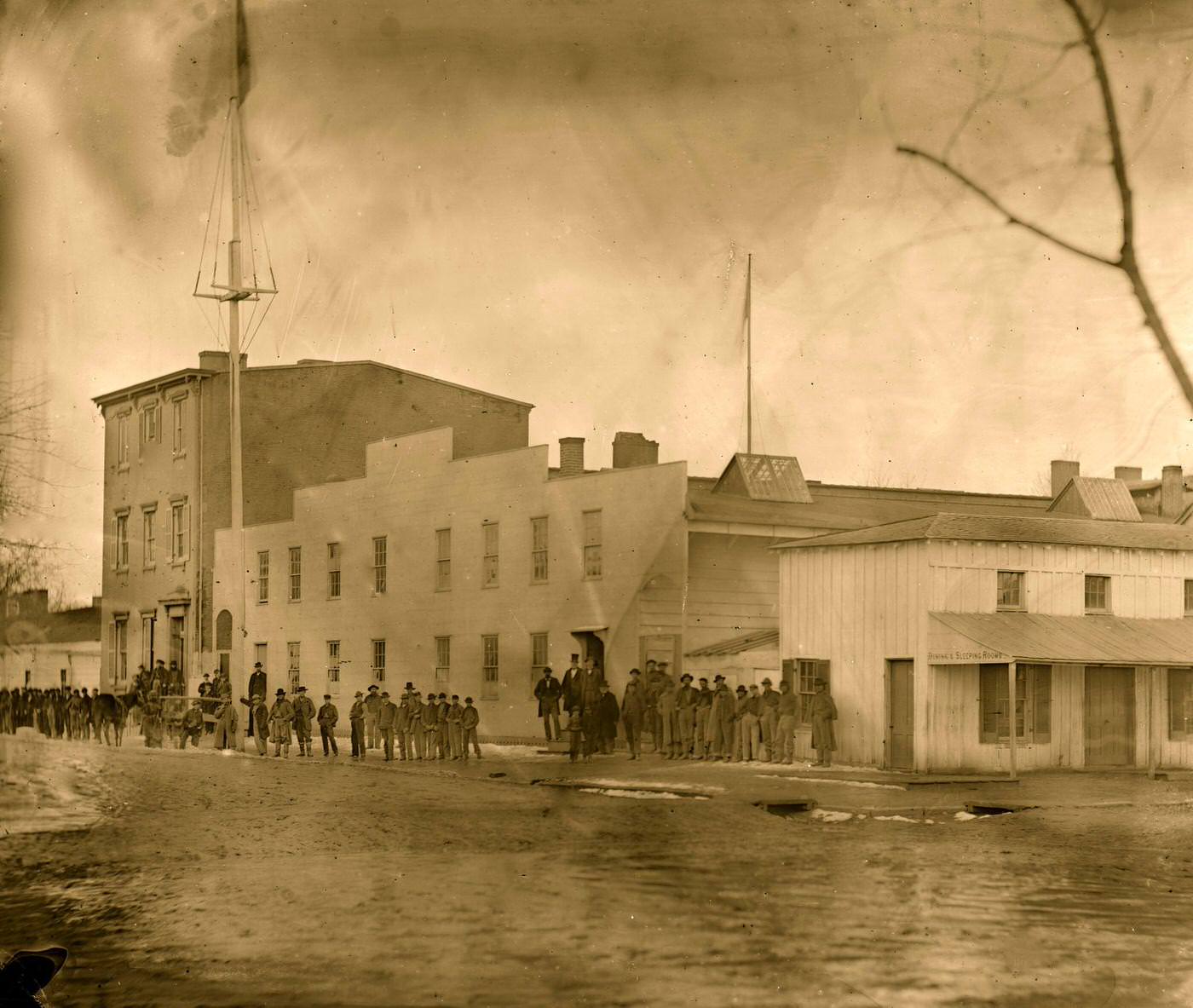 #174 View of men standing outside the government mess house, Washington, D.C., 1865